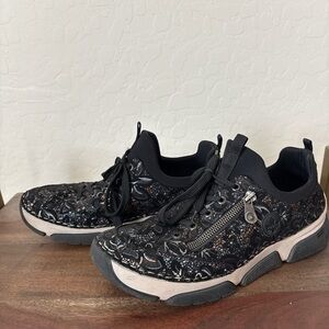 Rieker 45973 BasketFemme Black Lace-Patterned Slip-On women’s Sneakers. 8.5